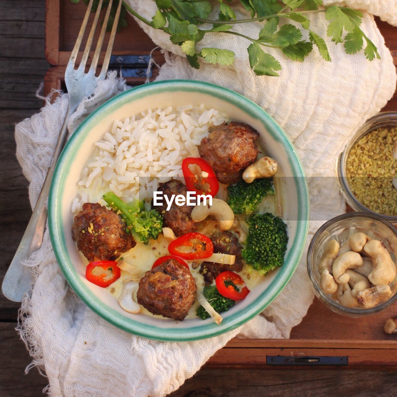 Directly above shot of rice and meatball curry in bowl on table