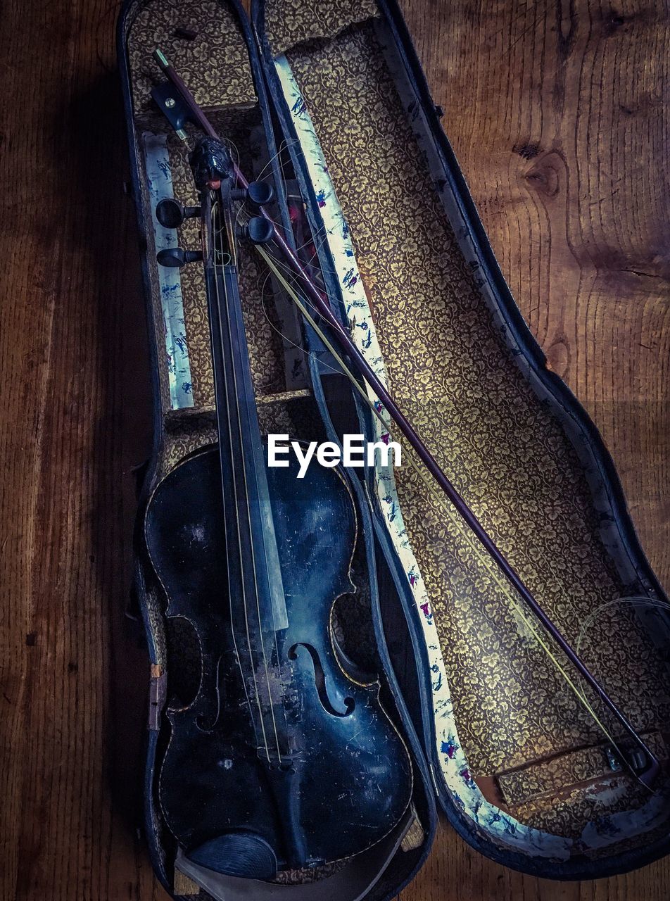 High angle view of violin on table