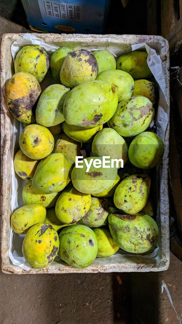 High angle view of fruits for sale at market stall