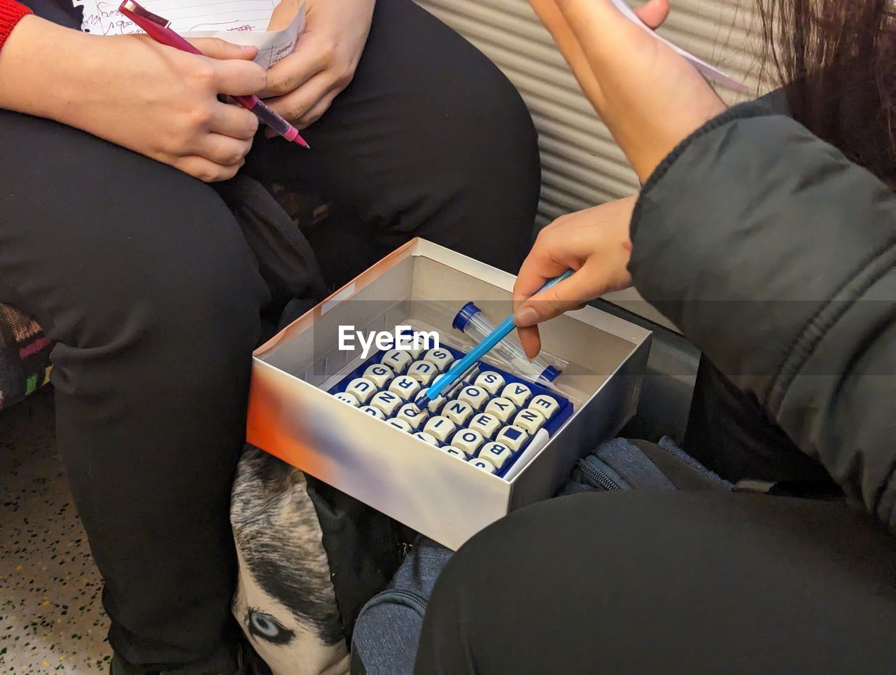 adult, sitting, women, two people, communication, clothing, wireless technology, technology, business, men, young adult, person, midsection, indoors, holding, togetherness, business finance and industry, high angle view, human leg, finance, computer, lifestyles, casual clothing, digital tablet