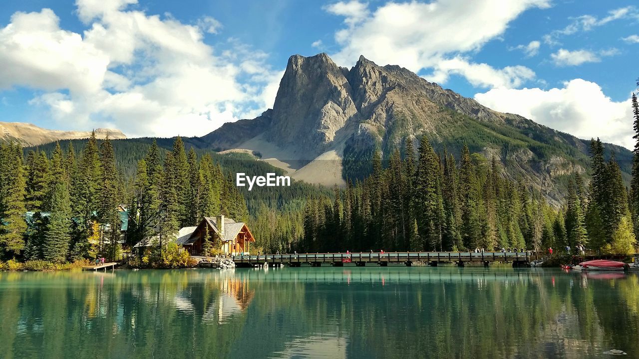 Scenic view of lake and mountains against sky at emerald lake, british columbia canada 