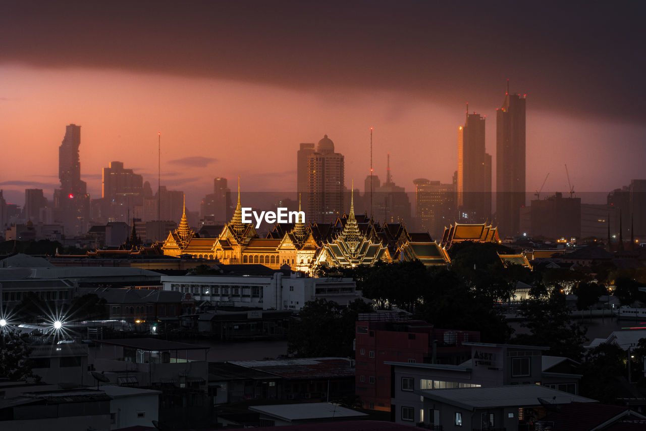 BUILDINGS IN CITY DURING SUNSET