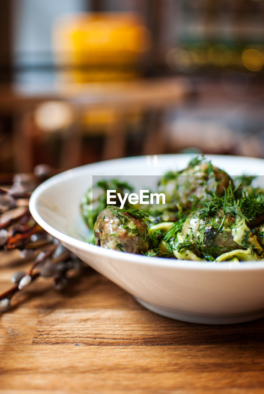 Close-up of salad in bowl on table