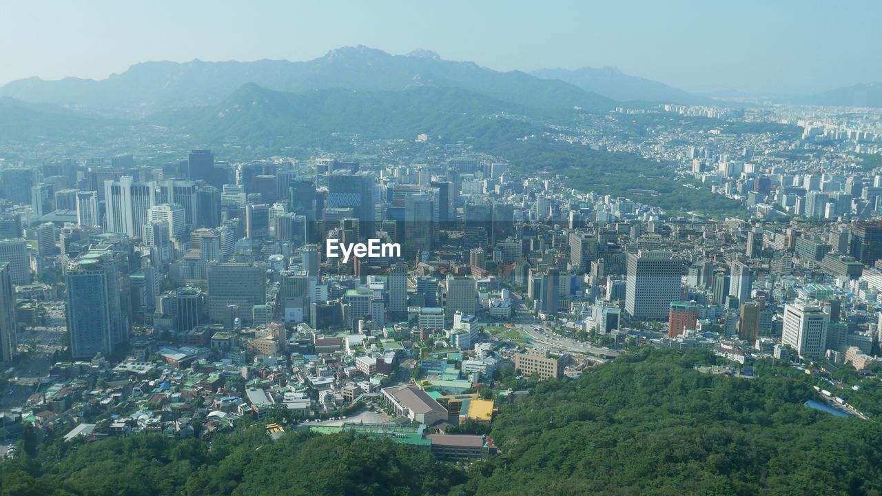 HIGH ANGLE VIEW OF BUILDINGS IN CITY