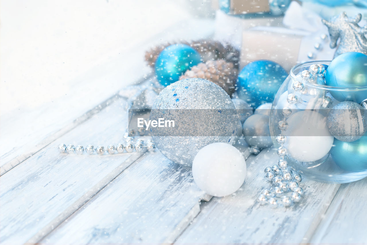 Close-up of christmas ornaments on table