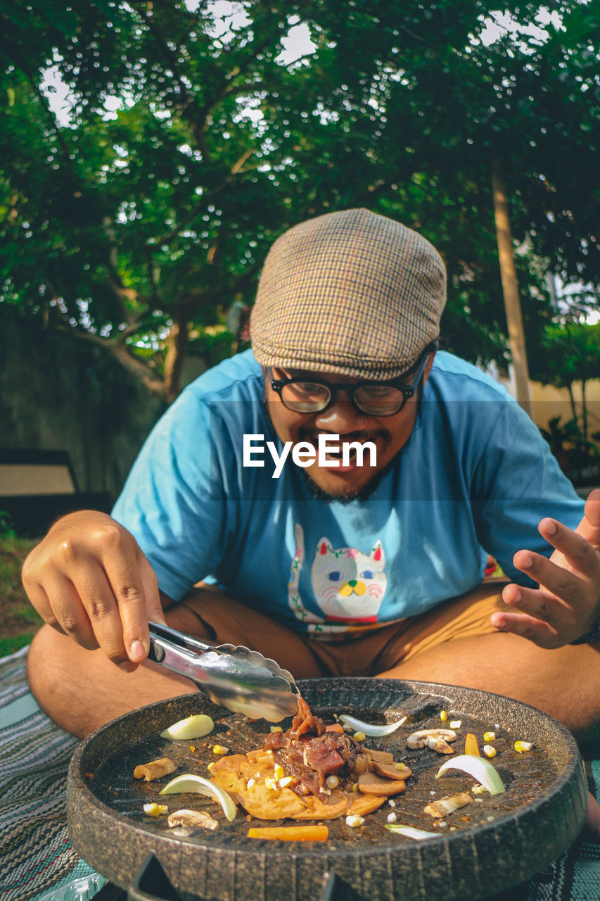 Young man eating food