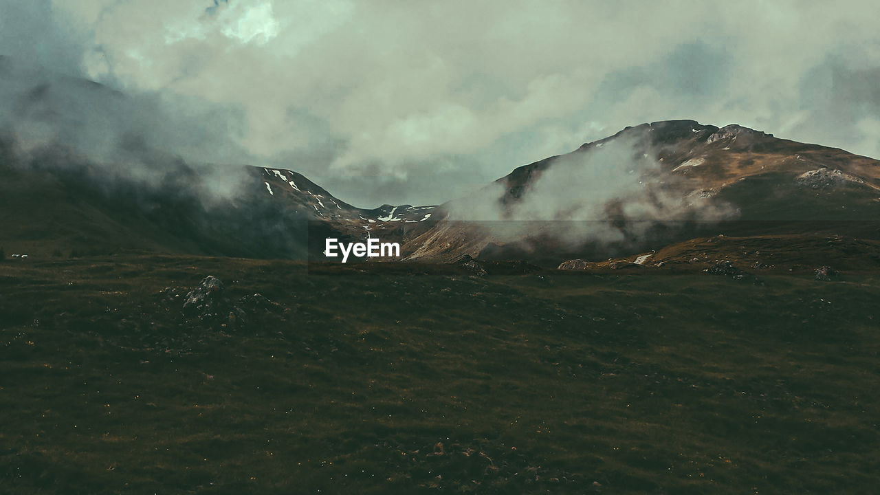 VIEW OF MOUNTAIN AGAINST SKY