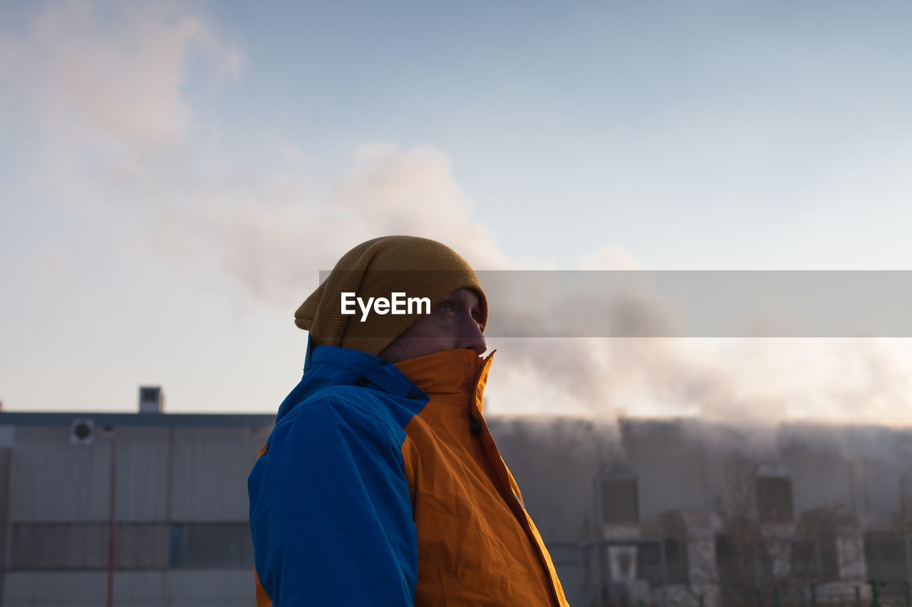 Low angle view of man against sky