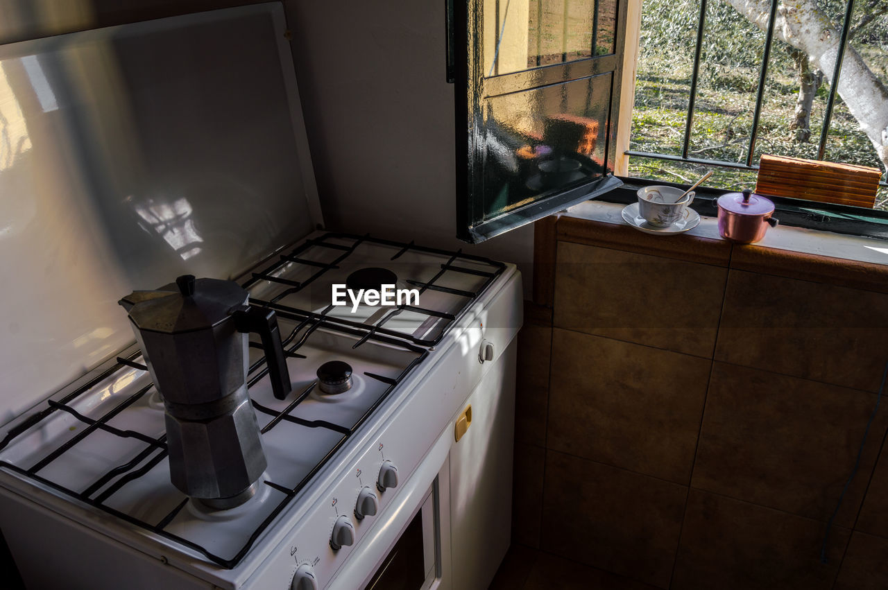 Coffee pot on stove at home