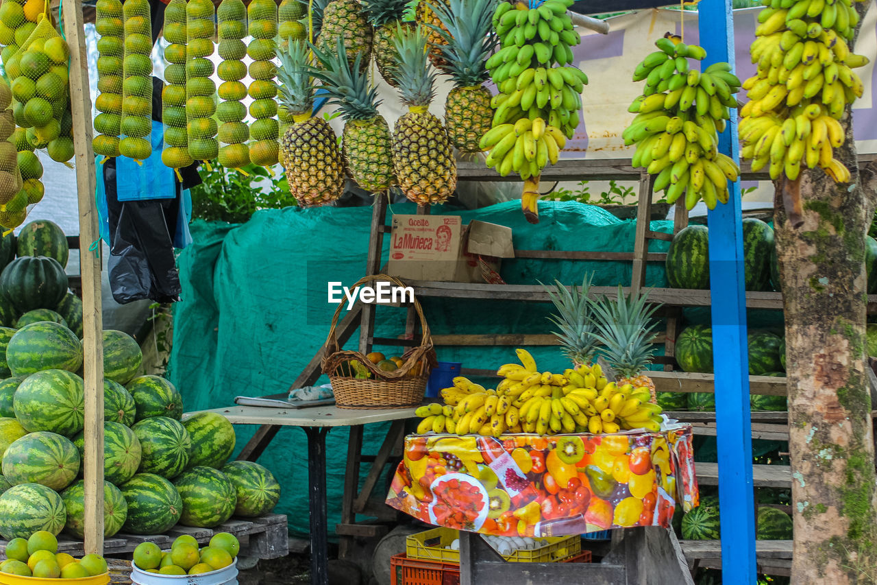 FRUITS FOR SALE IN MARKET STALL