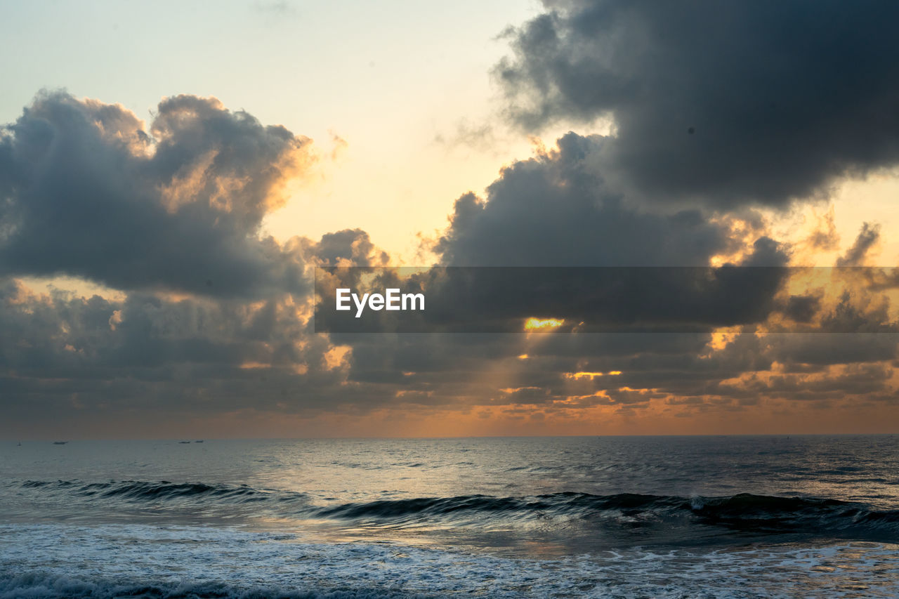 scenic view of sea against sky at sunset