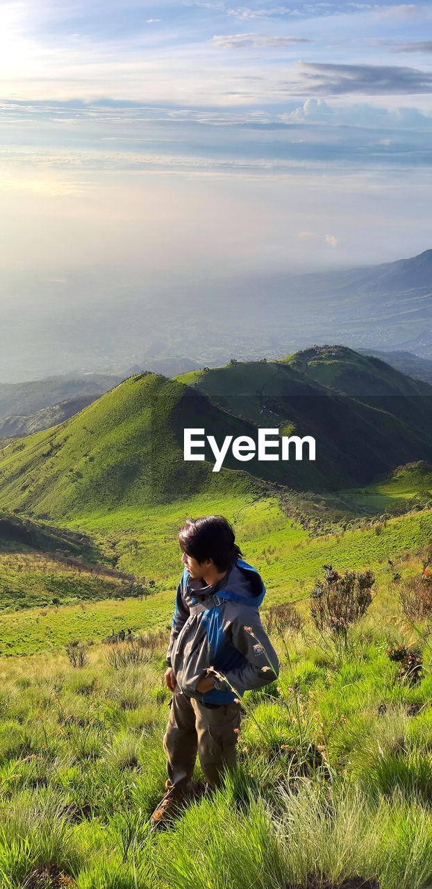 Full length of man on landscape against sky