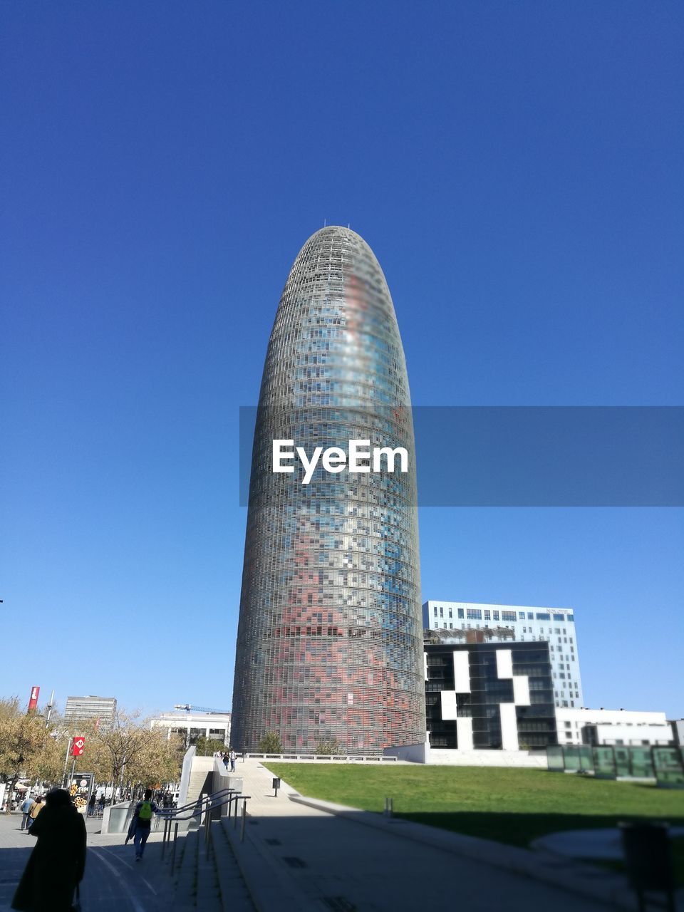 MODERN BUILDINGS AGAINST BLUE SKY