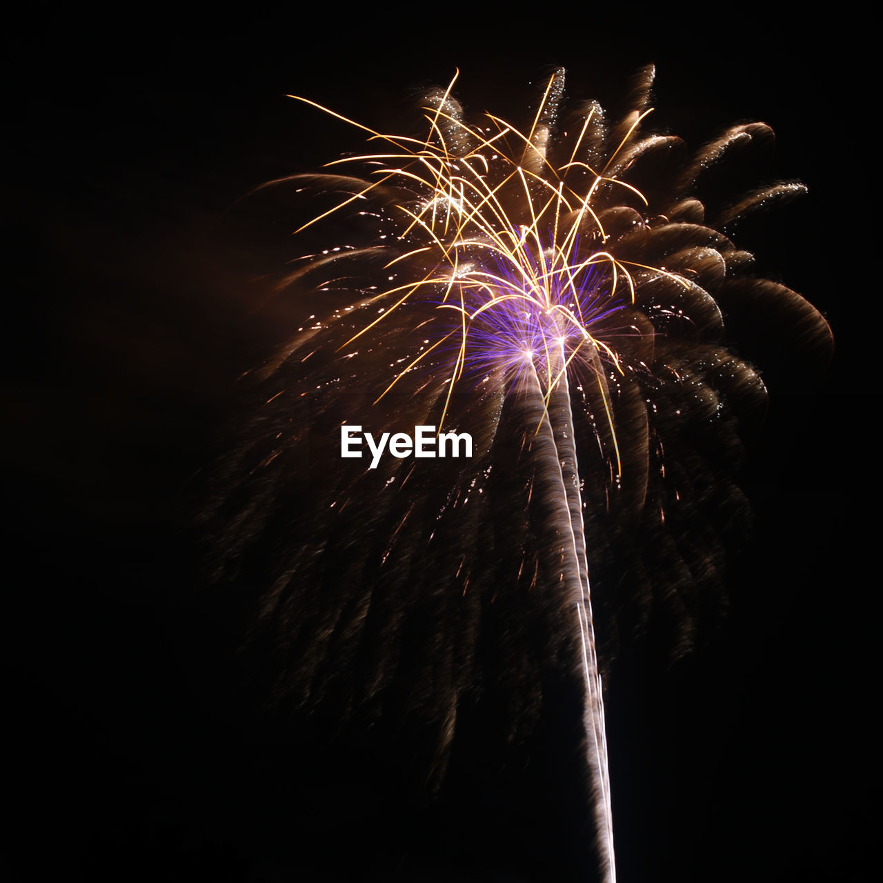 LOW ANGLE VIEW OF FIREWORK DISPLAY