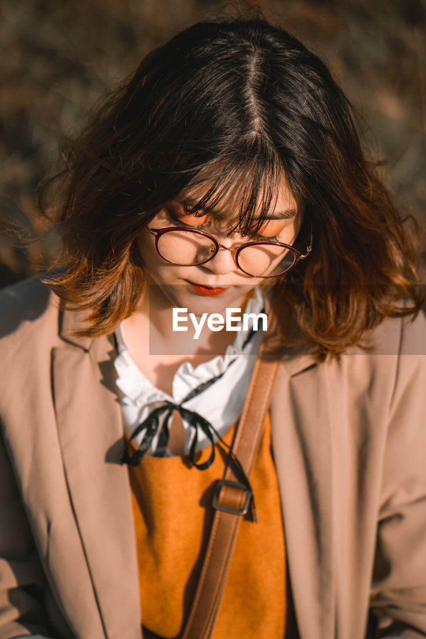 Close-up of woman in eyeglasses