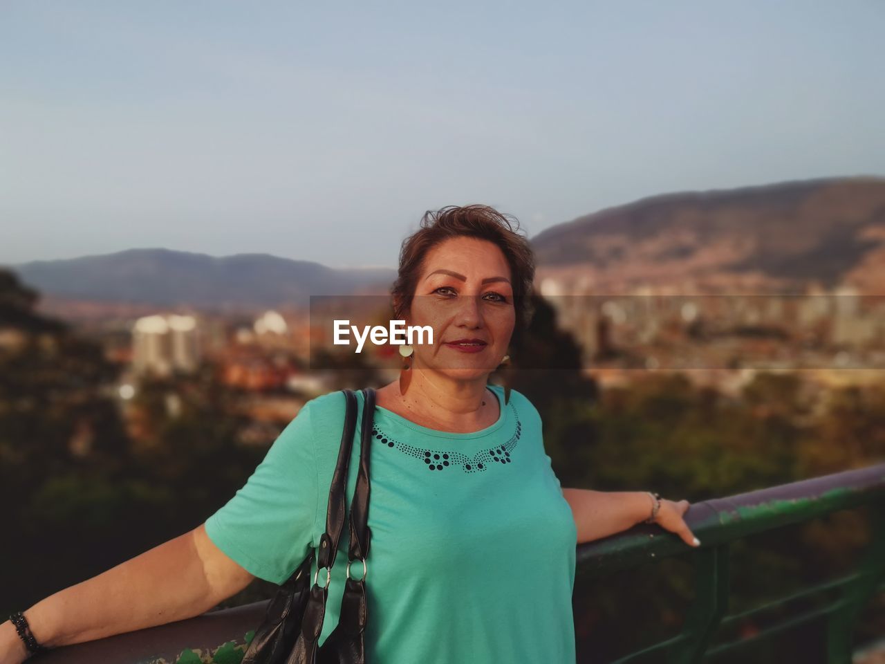 Portrait of woman against sky