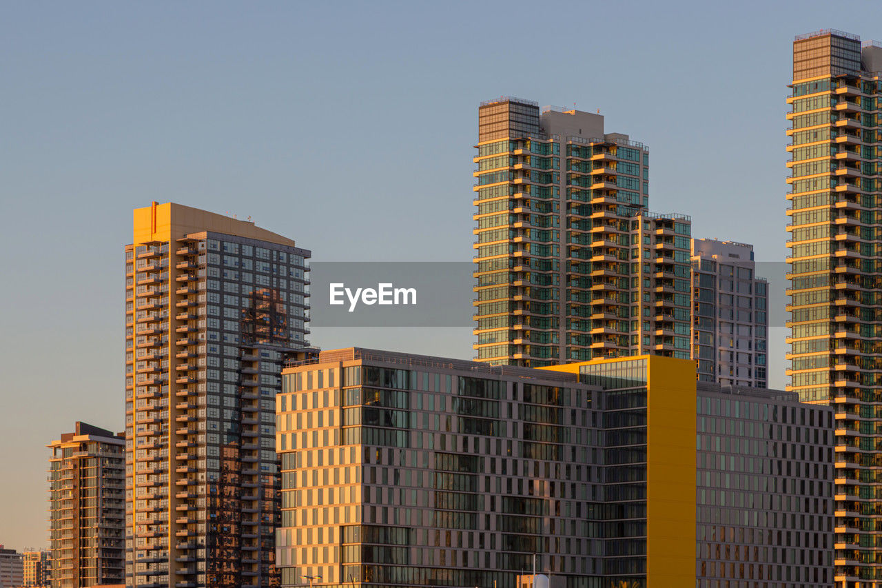 modern buildings in city against sky