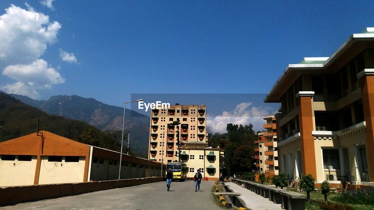 ROAD WITH BUILDINGS IN BACKGROUND