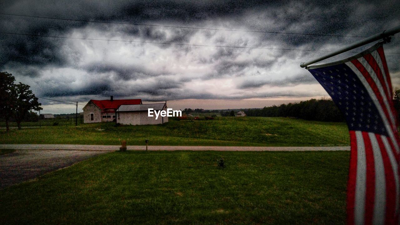 VIEW OF LANDSCAPE AGAINST CLOUDY SKY