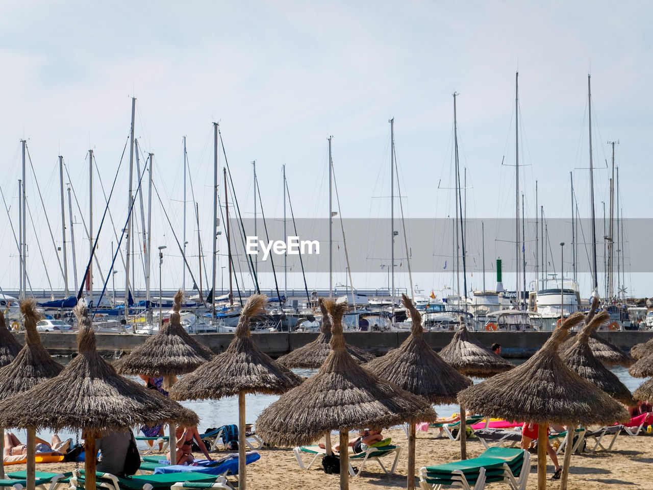 PANORAMIC VIEW OF HARBOR AGAINST SKY