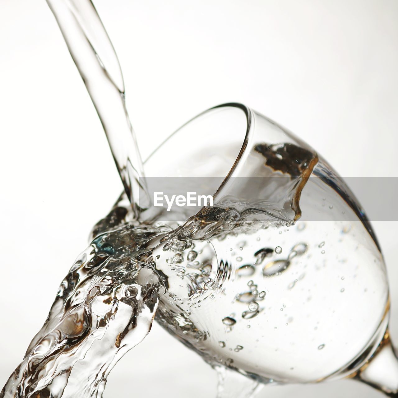 CLOSE-UP OF WATER ON WHITE BACKGROUND