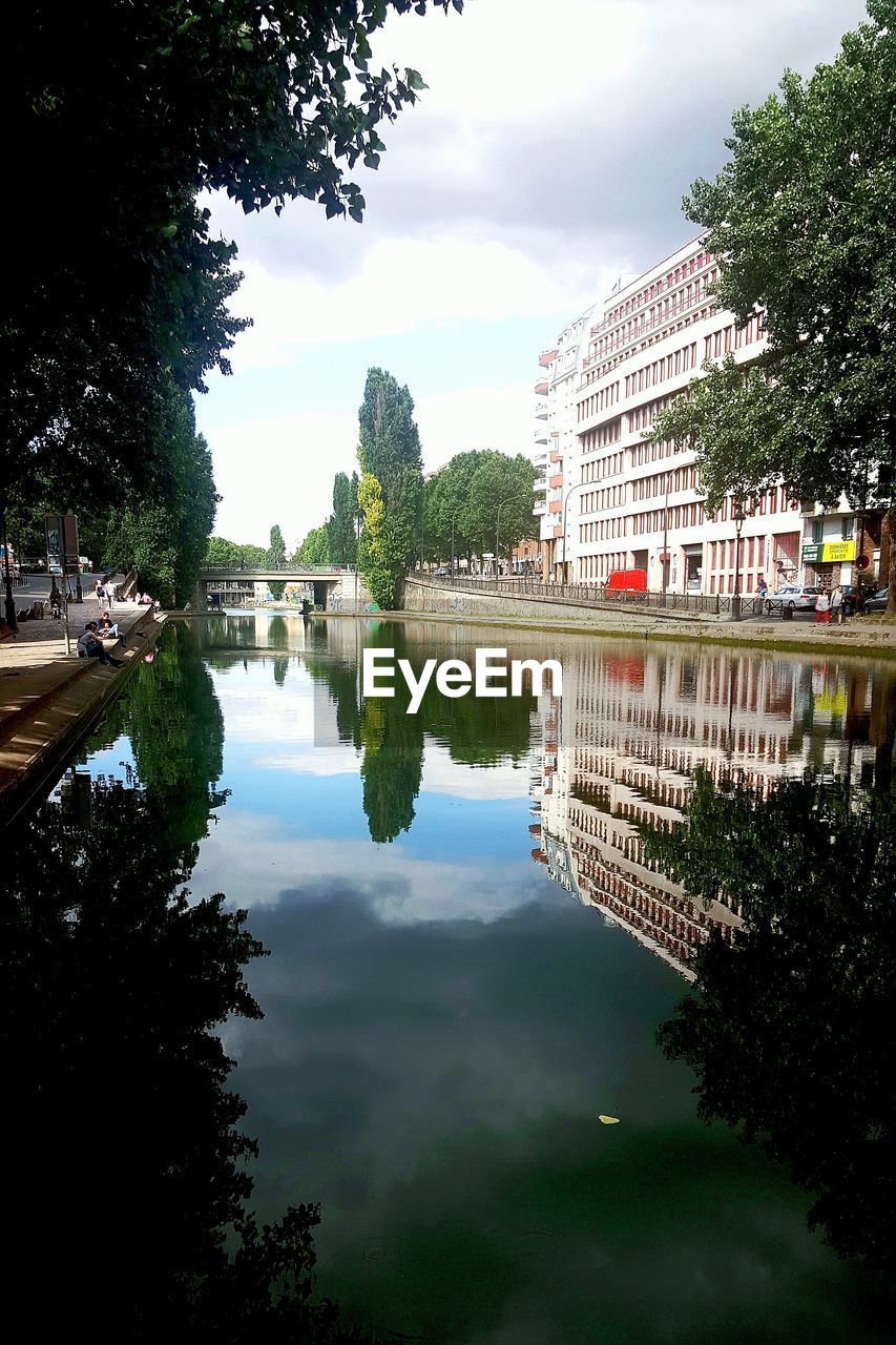 REFLECTION OF TREES IN WATER