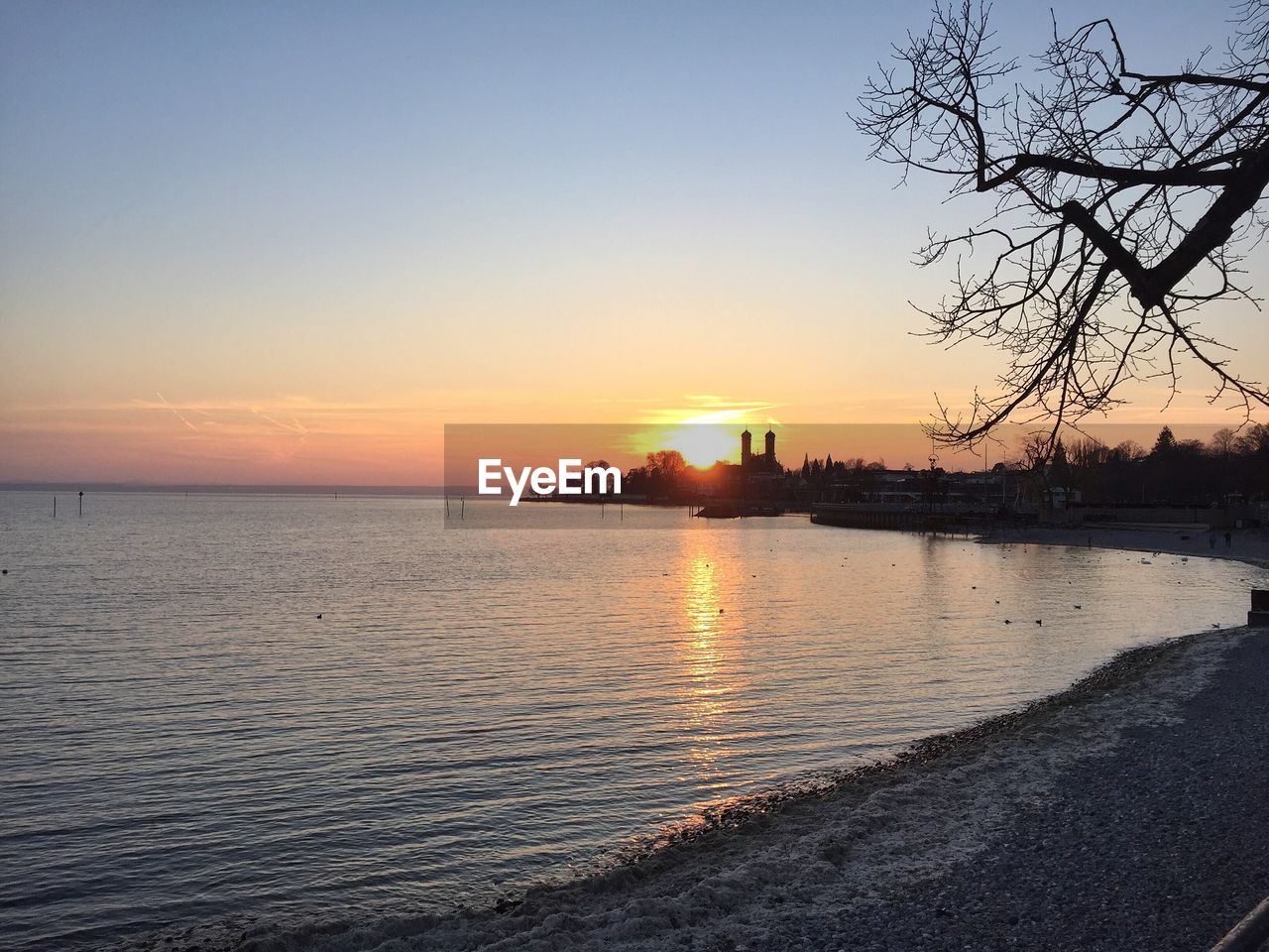 Scenic view of sea at sunset