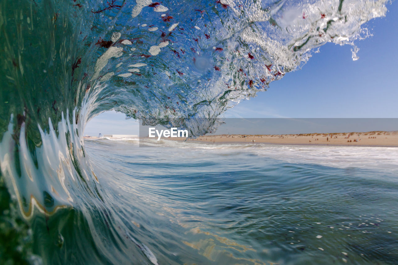 Close-up of curled up waves in sea