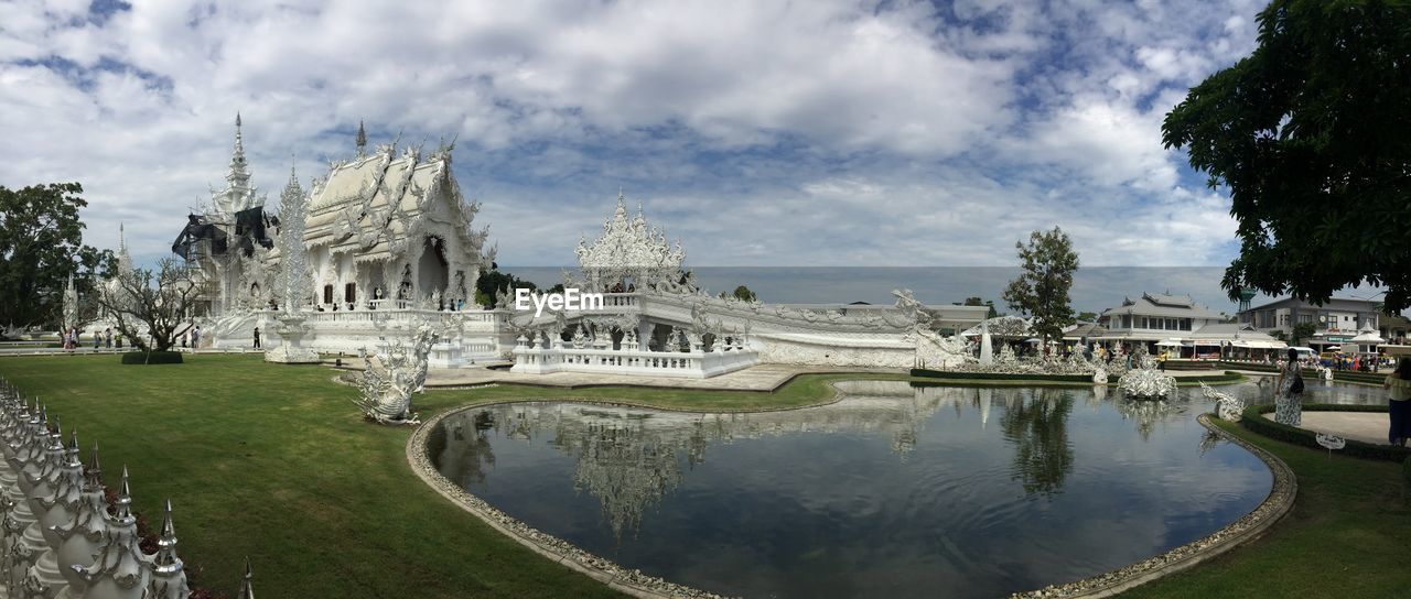 Panoramic view of lake against cloudy sky