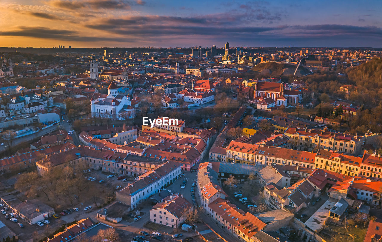 High angle view of city against sky during sunset