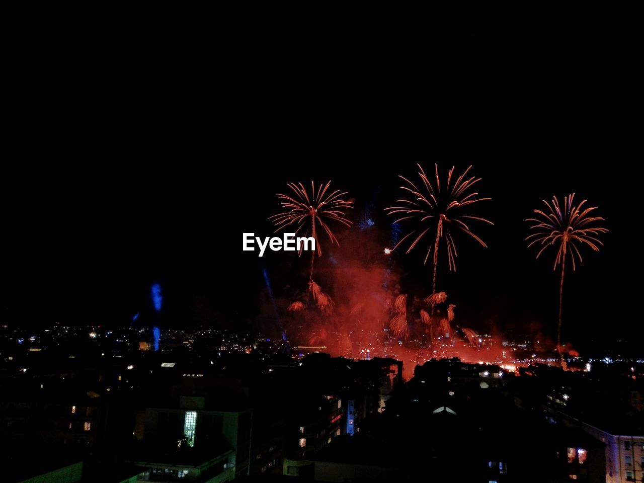 LOW ANGLE VIEW OF FIREWORK DISPLAY IN SKY AT NIGHT