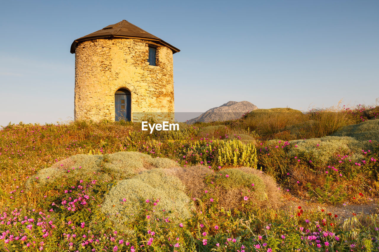 Old traditional windmill on the main island of fournoi korseon.