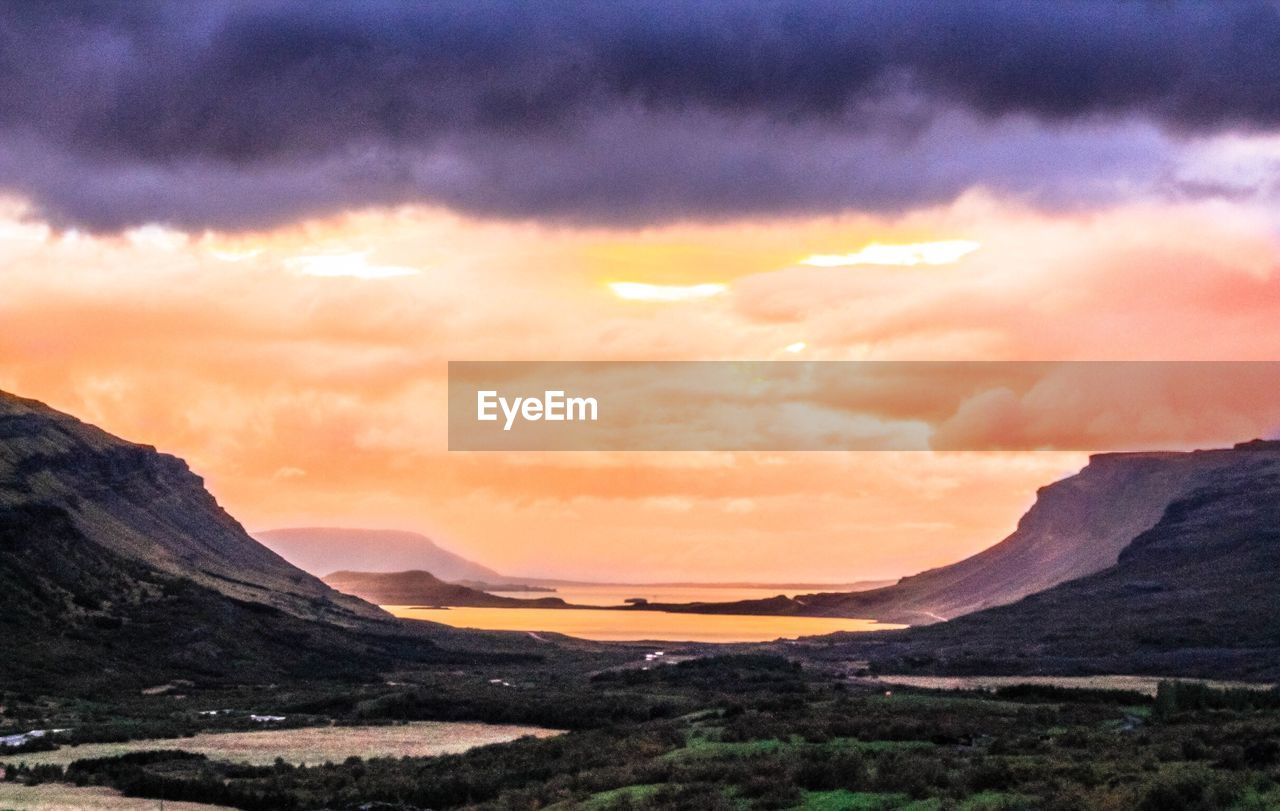 SUNSET OVER MOUNTAIN