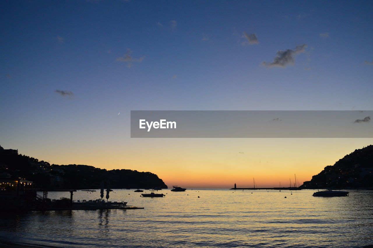 VIEW OF SEA AT SUNSET