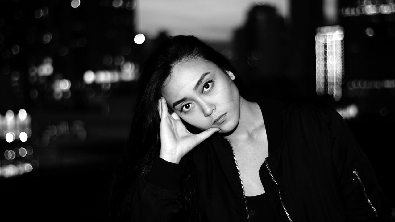 CLOSE-UP PORTRAIT OF YOUNG WOMAN WITH EYES CLOSED