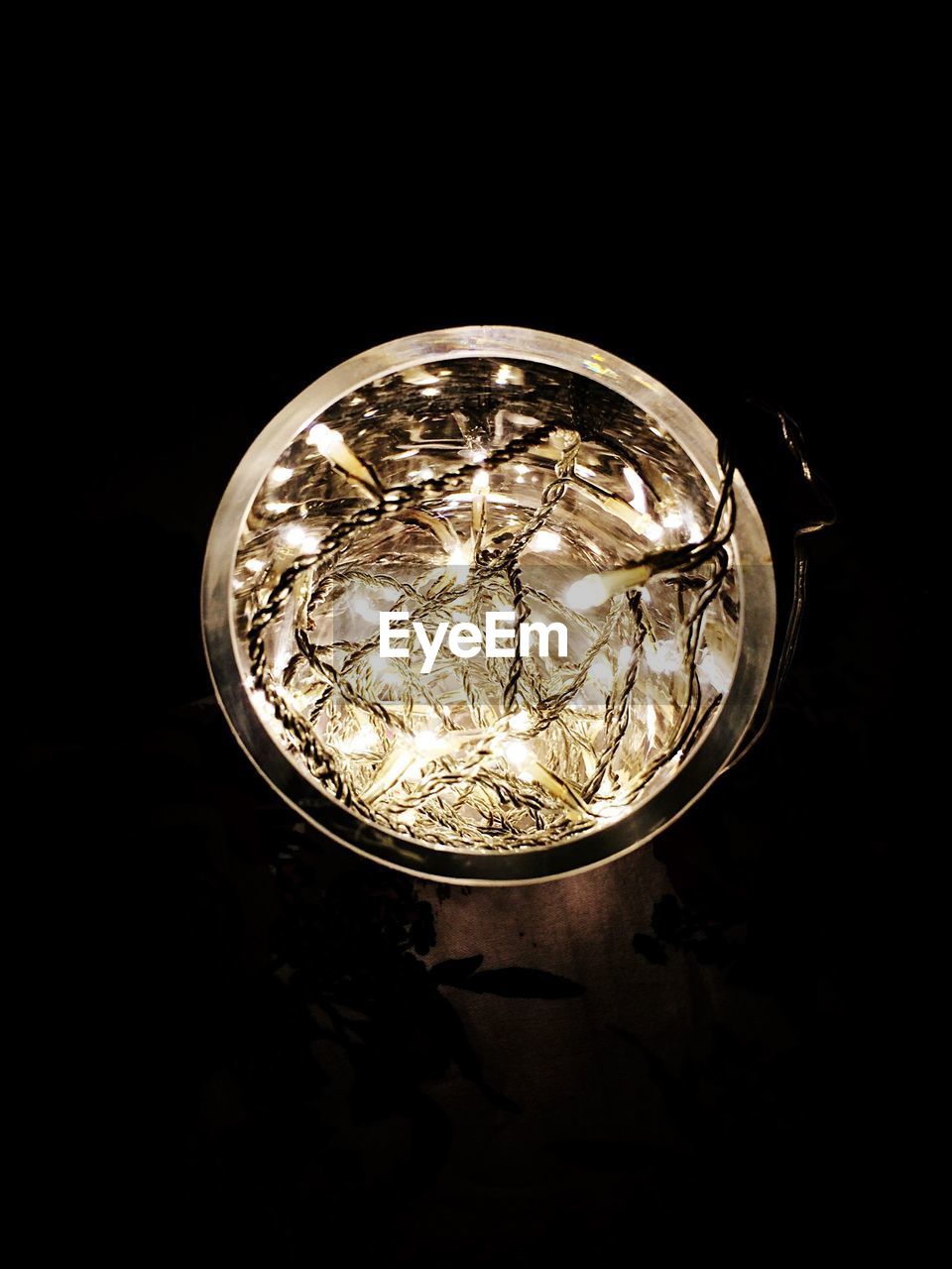 CLOSE-UP OF ILLUMINATED LIGHTS