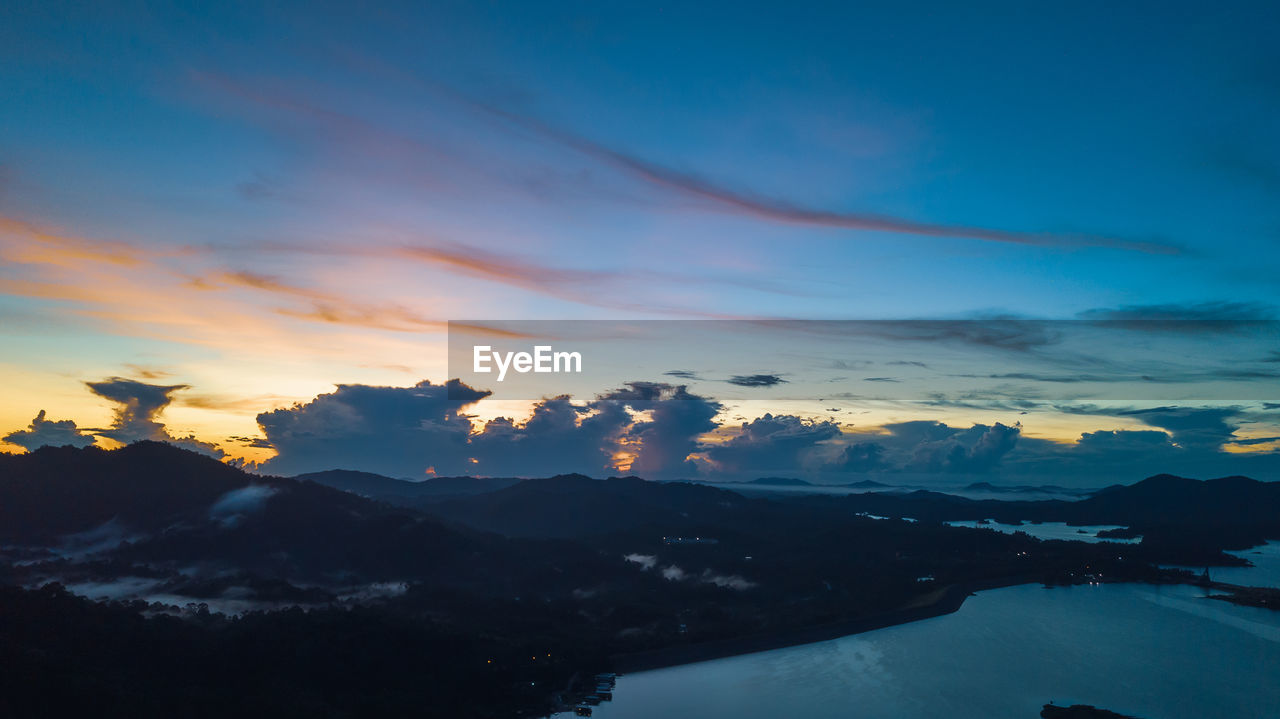 Aerial view of kenyir lake during blue hour sunrise.