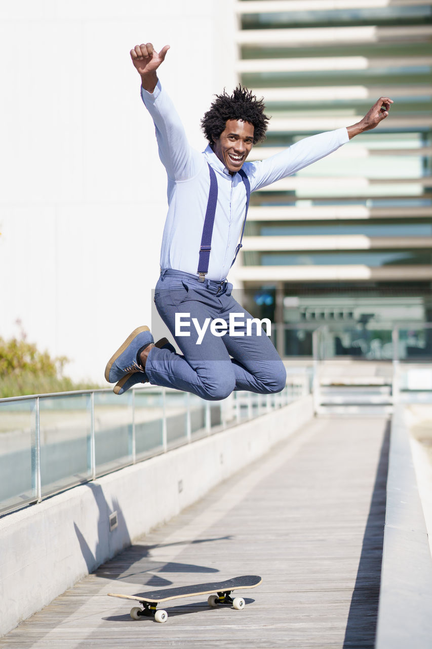 Full length of young man jumping