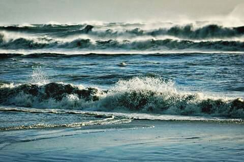 WAVES SPLASHING ON SHORE