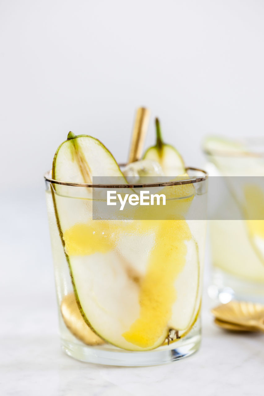 CLOSE-UP OF DRINK ON GLASS