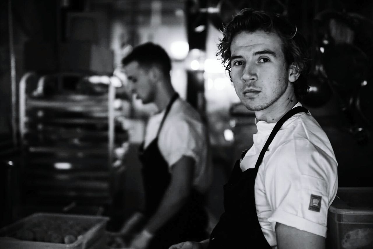 Portrait of chef cooking in kitchen at restaurant