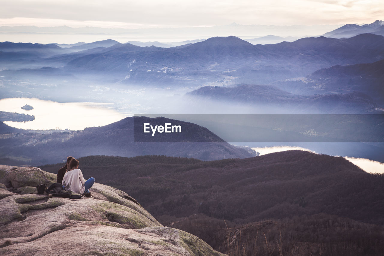 Scenic view of people on mountain