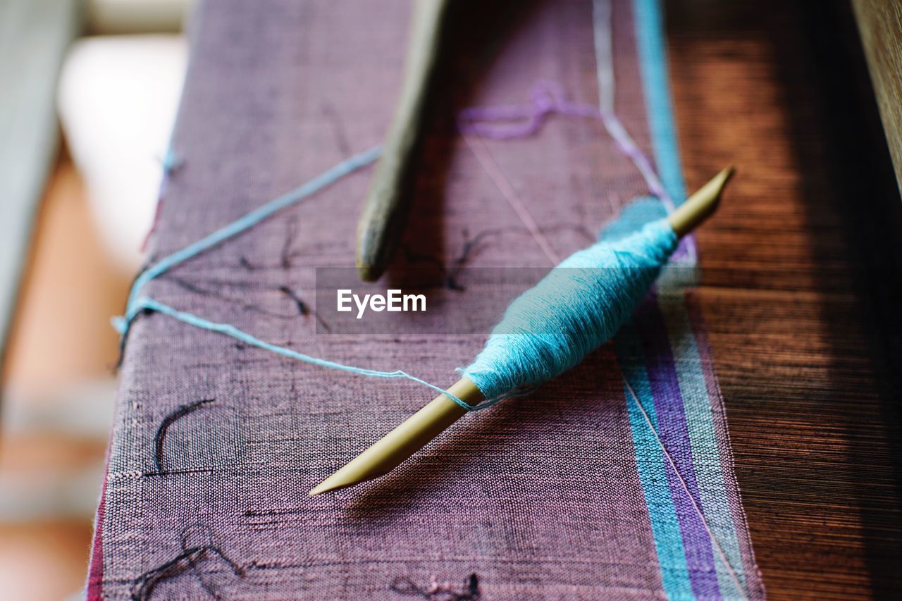 CLOSE-UP OF AN WORKING ON WOOD