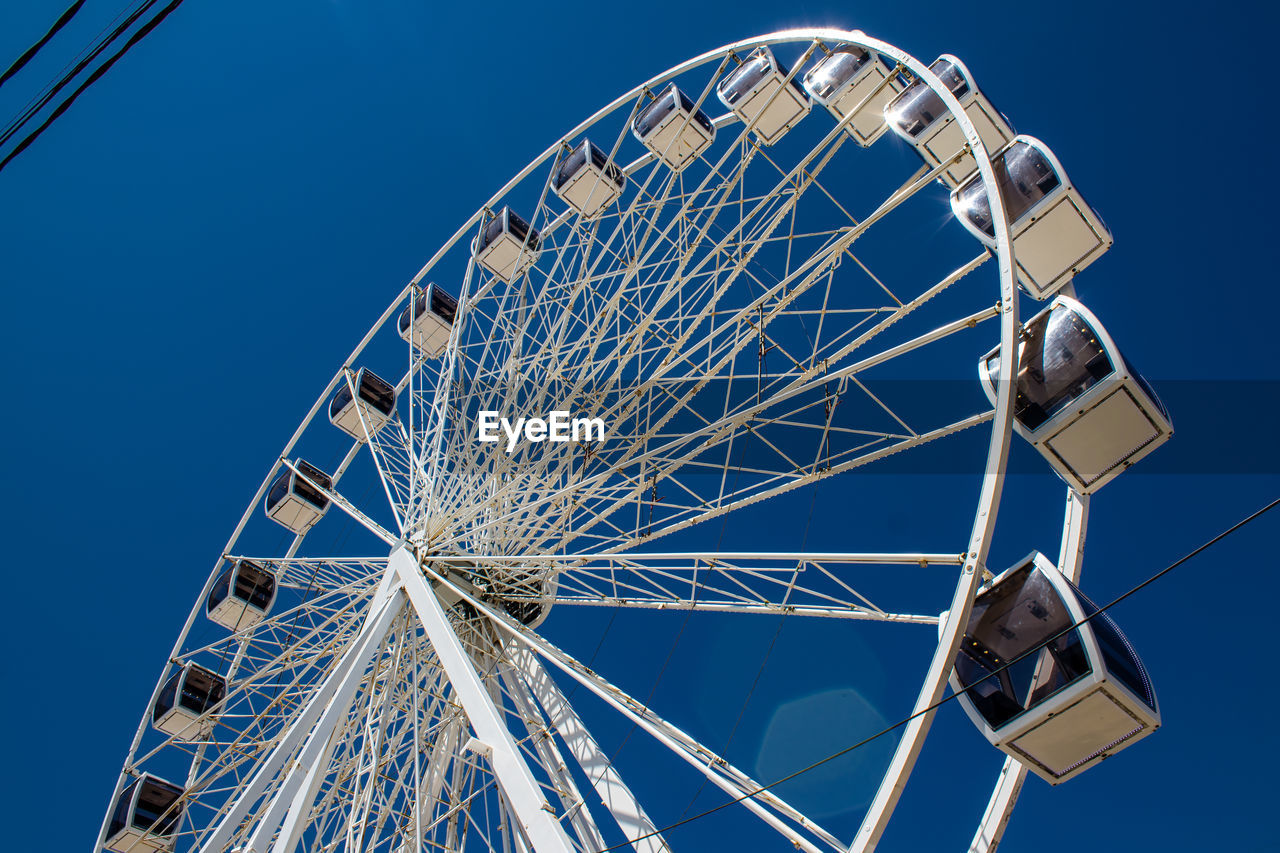 low angle view of eiffel tower against clear blue sky