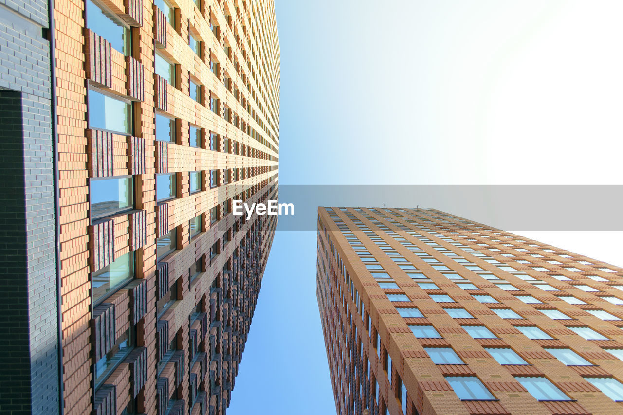 Low angle view of modern building against sky