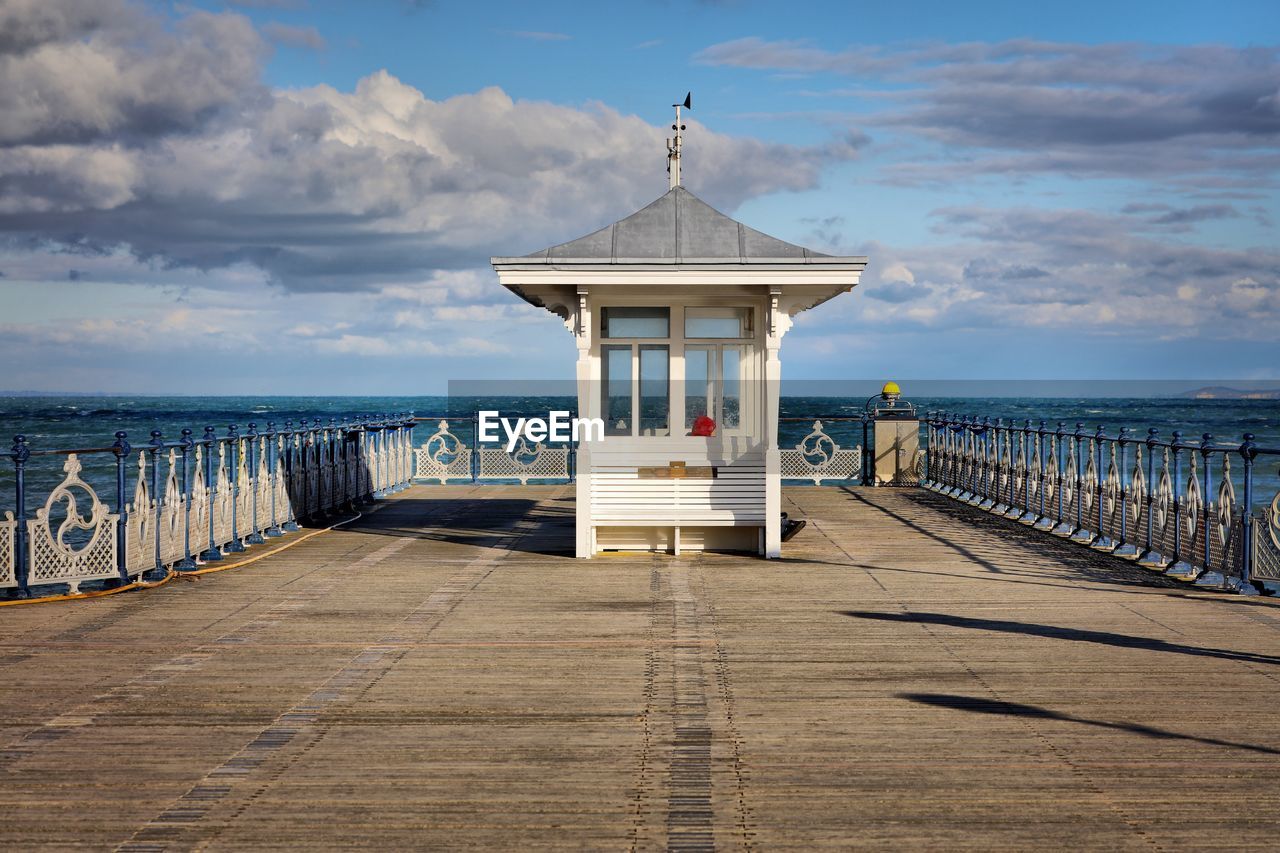 Pier over sea against sky