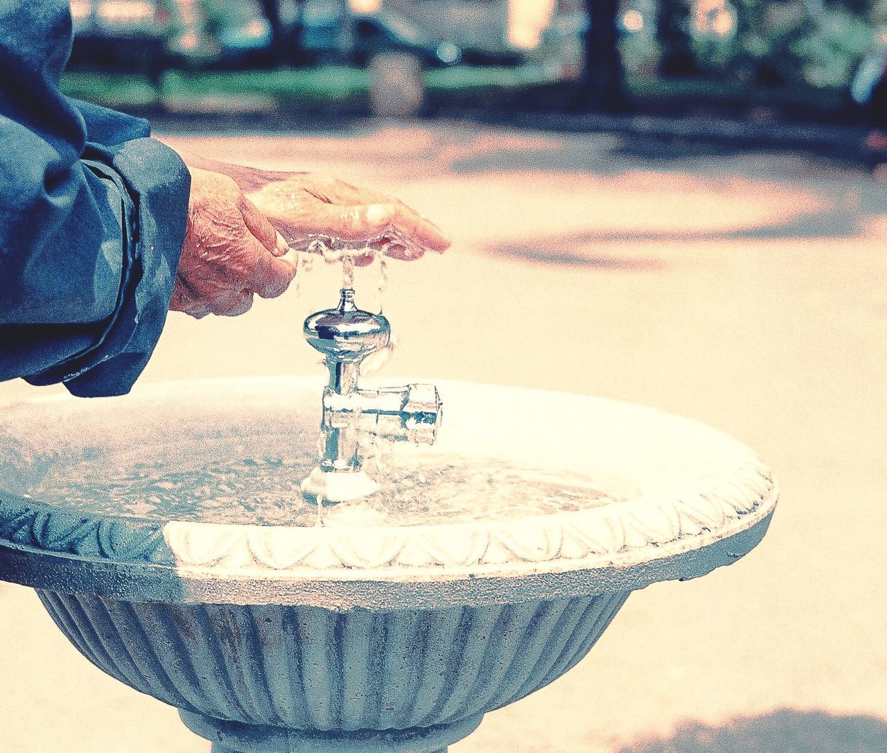 Old man at the fountain