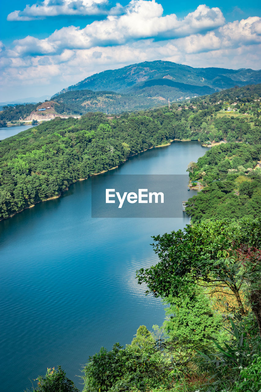 Serene lake with mountain background at day from top angle