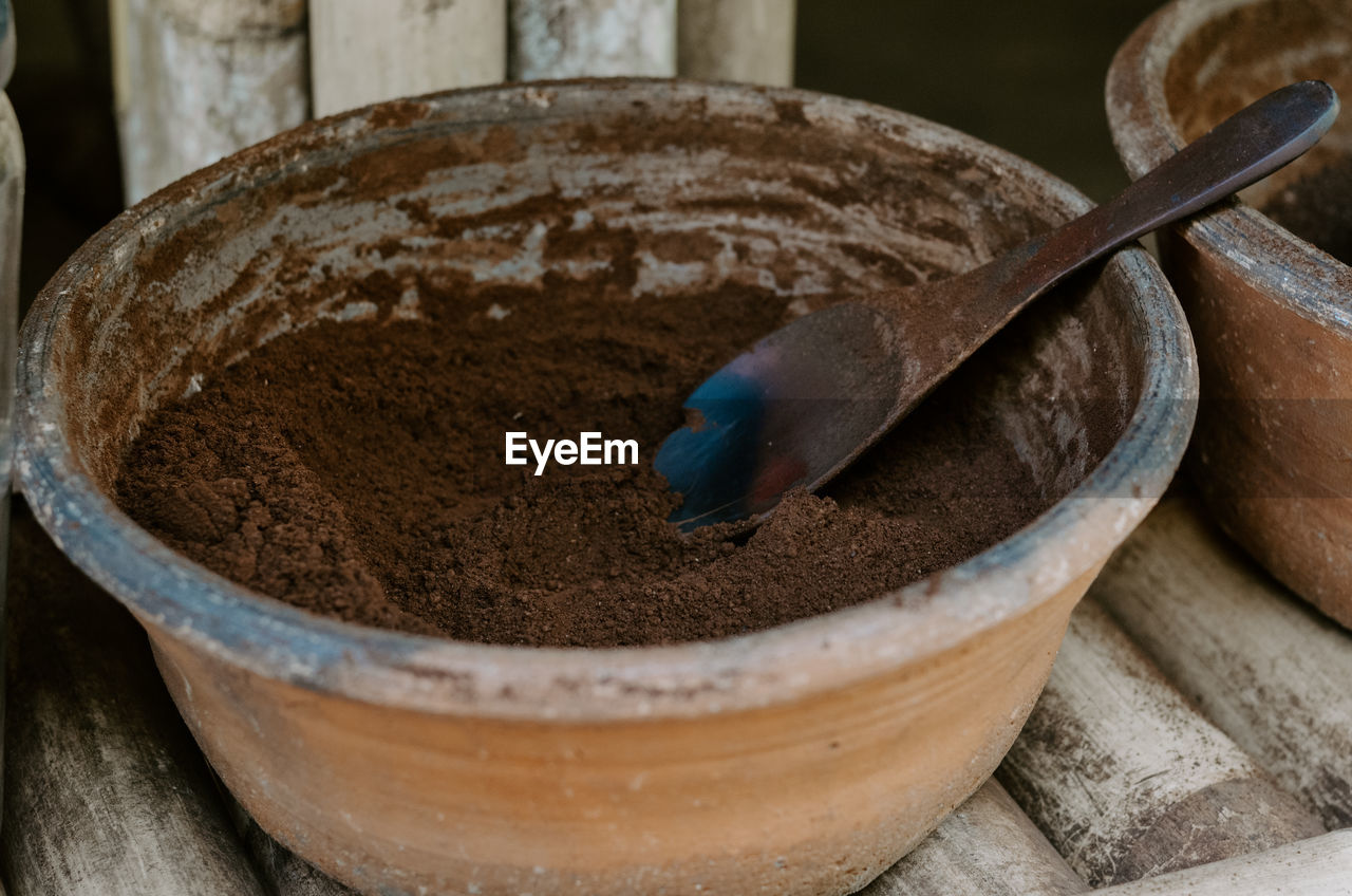 wood, food and drink, kitchen utensil, food, baked, indoors, close-up, no people, household equipment, bowl, eating utensil, spoon, still life, container, freshness