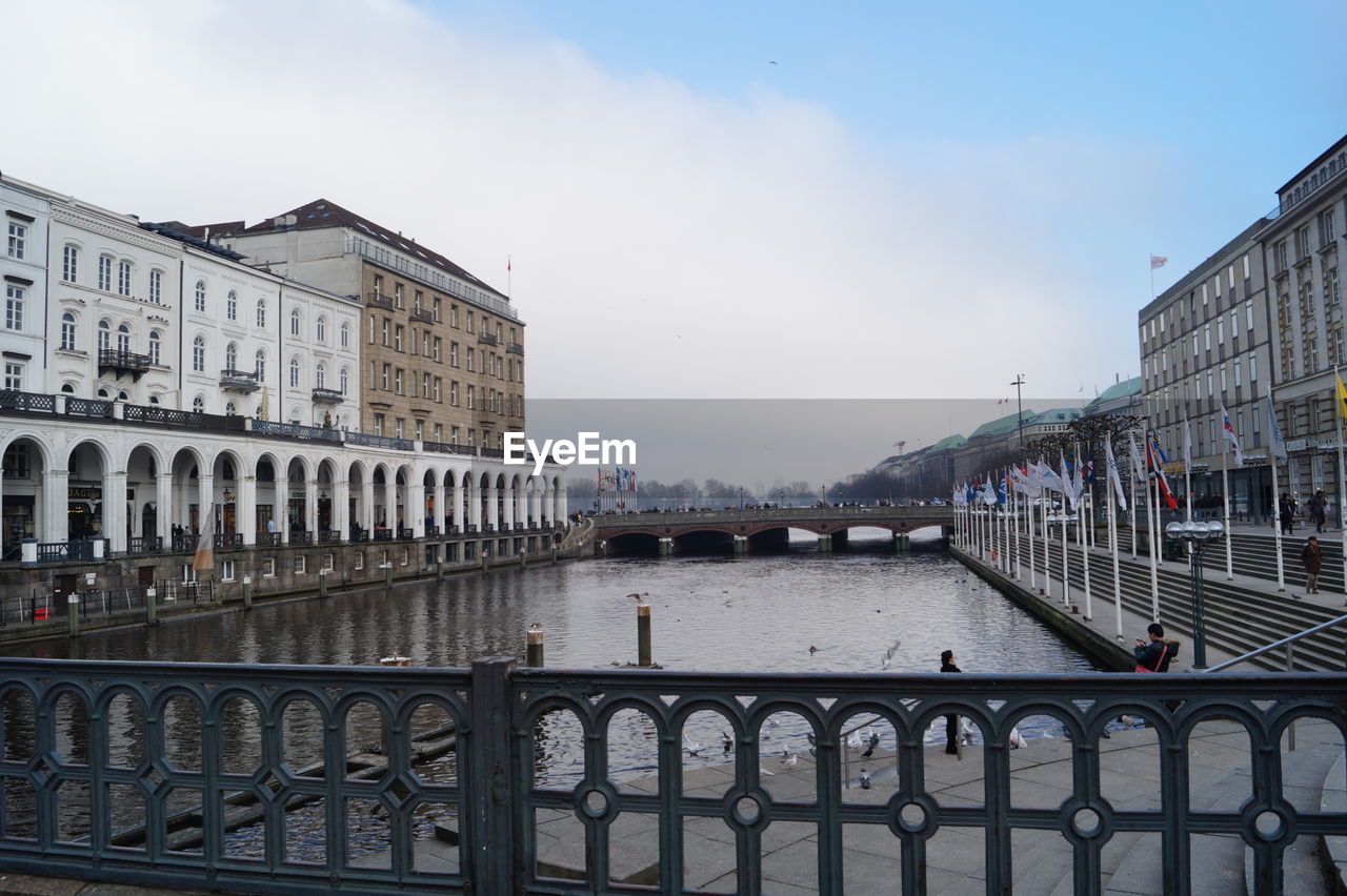 River amidst buildings